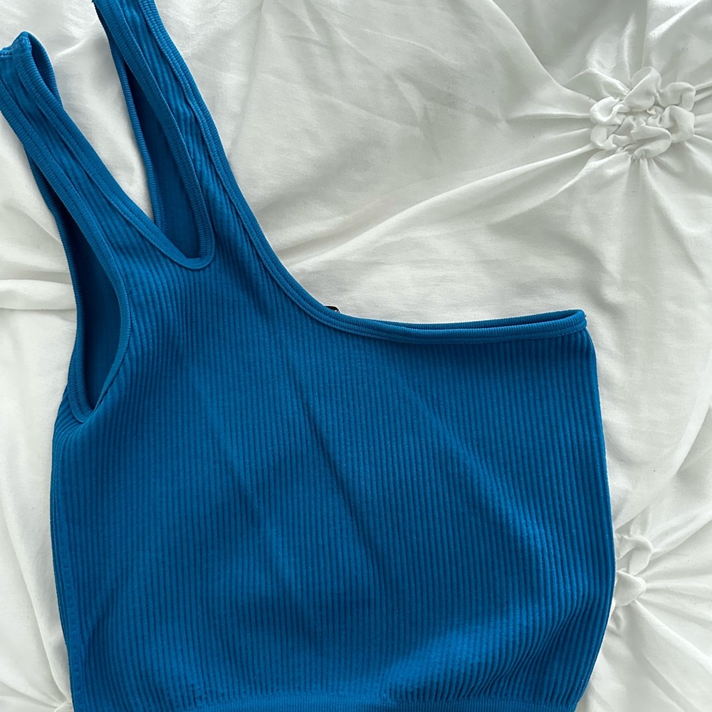 Blue cropped one shoulder tank top. Only worn once. Great condition.